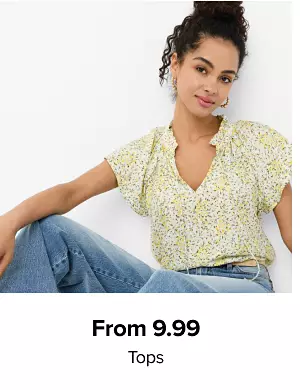 A woman with a floral top. From 9.99 tops.