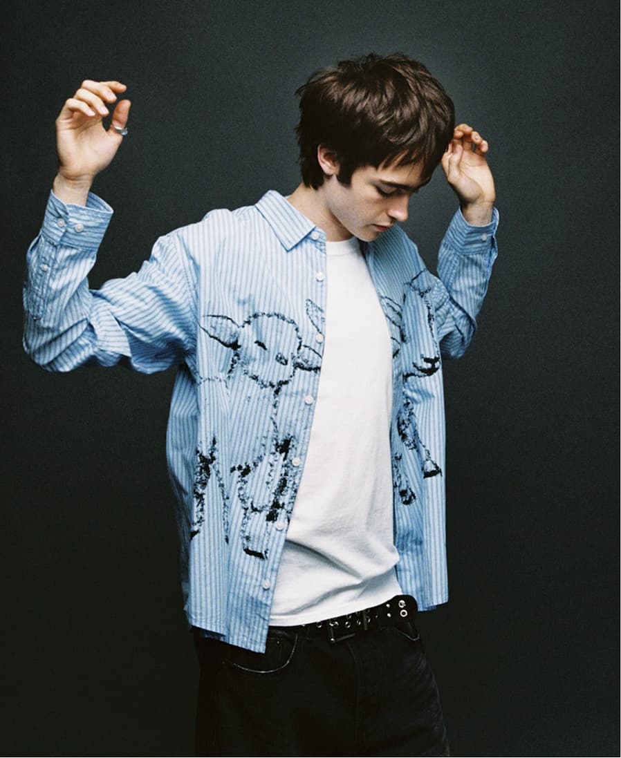Male model wearing button up shirt from Obey fall collection