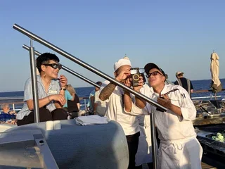 Crew Looking at Photo