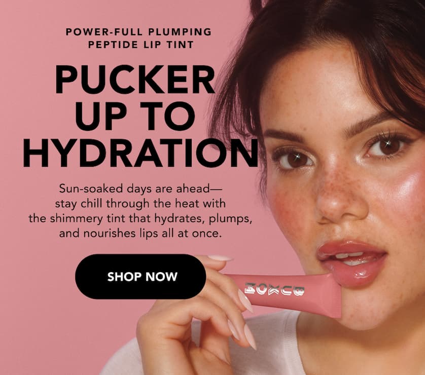 Model holding Power-Full Plumping Peptide Lip Tint