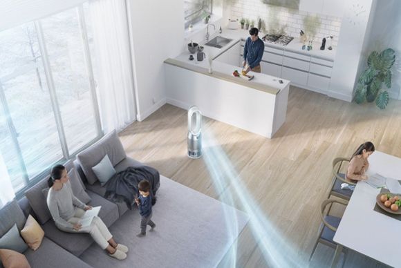 Dyson purifier fan centrally placed to cool and purify the air in an open plan living space.
