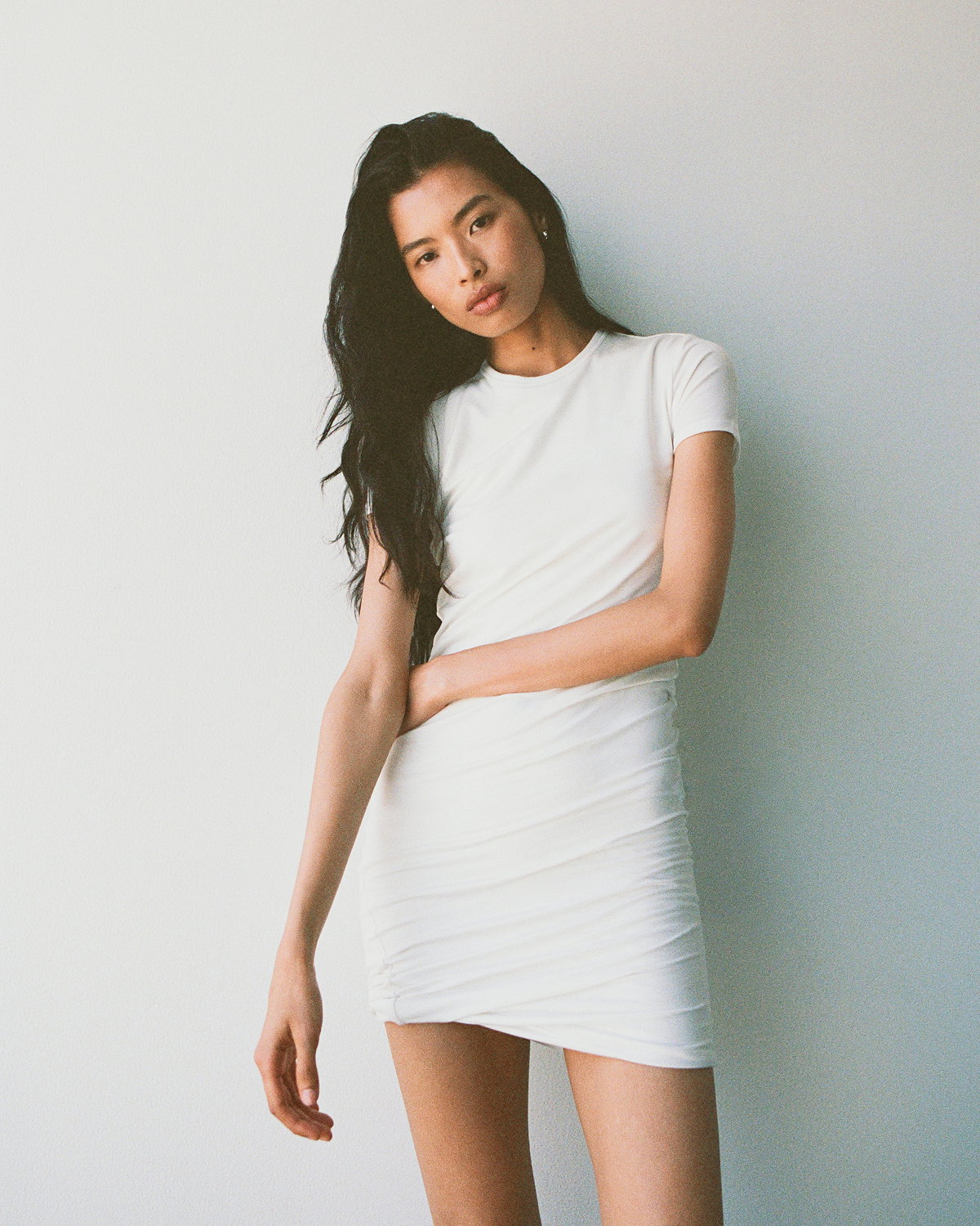  Editorial Image | Model in Twisted Short-Sleeve Crew Dress | White