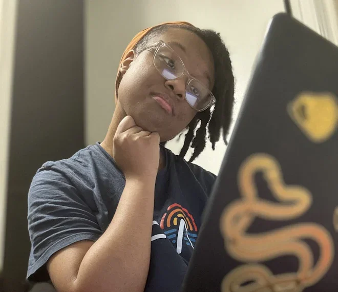 Nasiyah Isra-Ul on her laptop