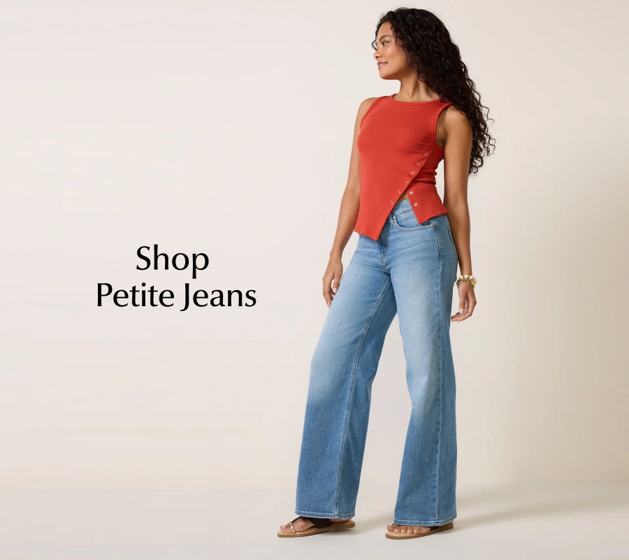 SHOP PETITE JEANS. Fashion image of petite model in wide-leg jeans from EVEREVE.
