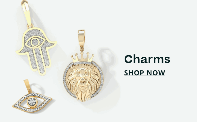 Gold pendants with diamond-encrusted Hamsa, lion & protective evil eye charm. Charms. Click here to shop now