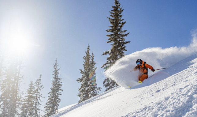 Skier making slash turn