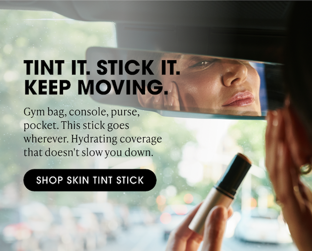 Model applying Skin Tint Stick