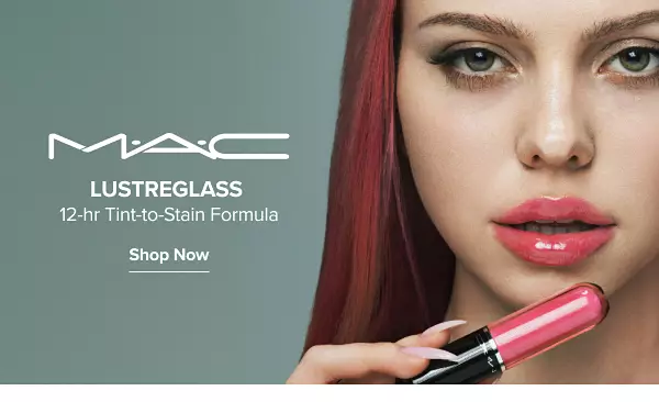 Image of a woman holding a lip product. MAC Lustreglass 12-hr tint-to-stain formula. Shop now.
