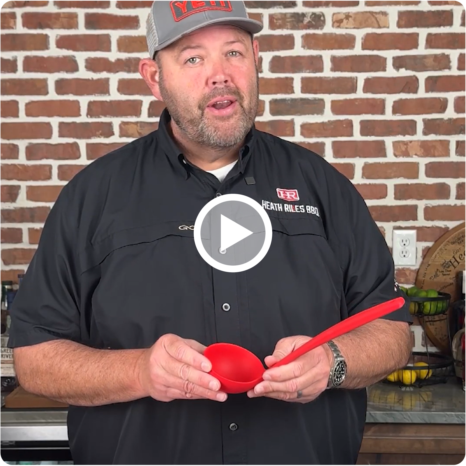 Heath Riles Holding a Silicone Ladle