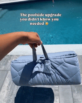 GIF of the terrazzo slate picnic blanket by a pool