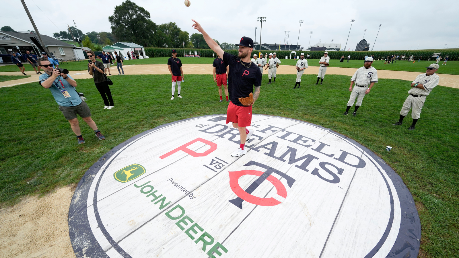 A Phillies player throws from the mound at the Field of Dreams movie field