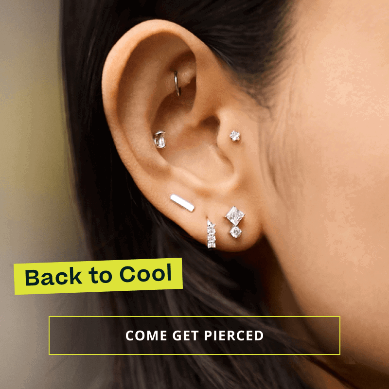 Model with geometric cubic zirconia studded ear stack. Back to cool. Click here to come get pierced