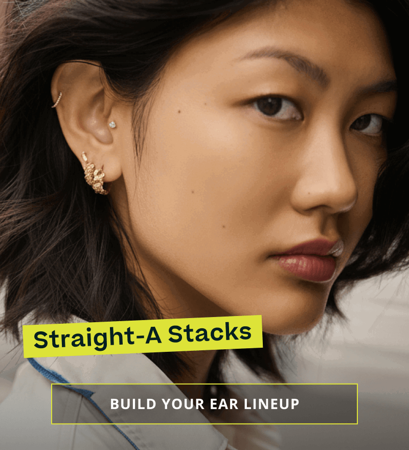 Model with geometric gold & diamond ear stack.  Straight-A stacks. Click here to build your ear lineup