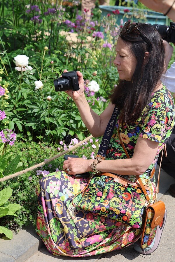 Emma taking photos at Chelsea flower show