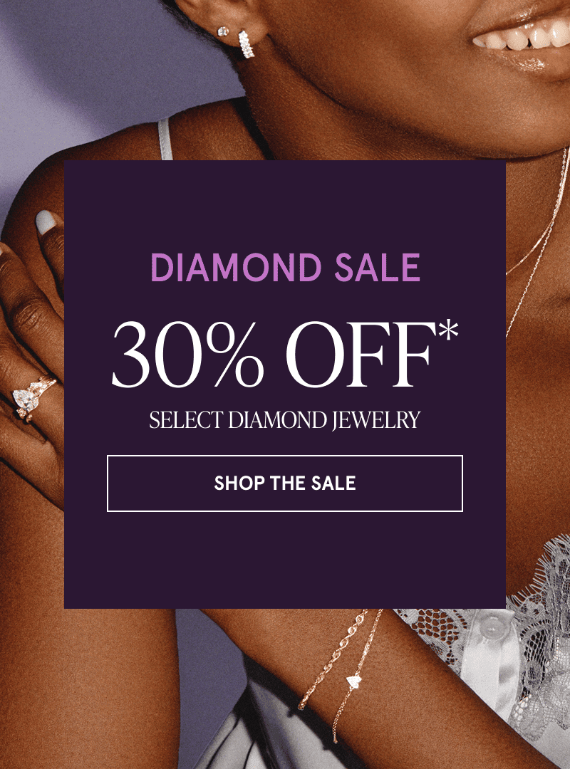 A model wearing gold diamond jewelry. Diamond sale. 30% off select diamond jewelry. Click here to shop the sale