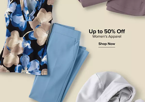 Up to 50% off womens apparel. Shop now. A sleeveless top with flowers and pair of blue pants.