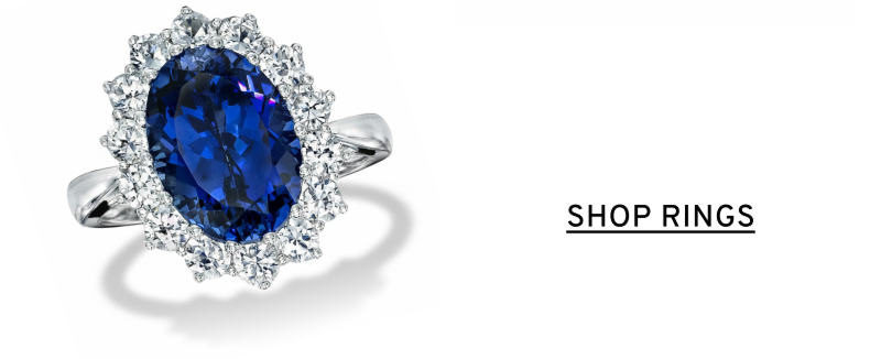 A sapphire and white gold cocktail ring. Click to Shop Rings
