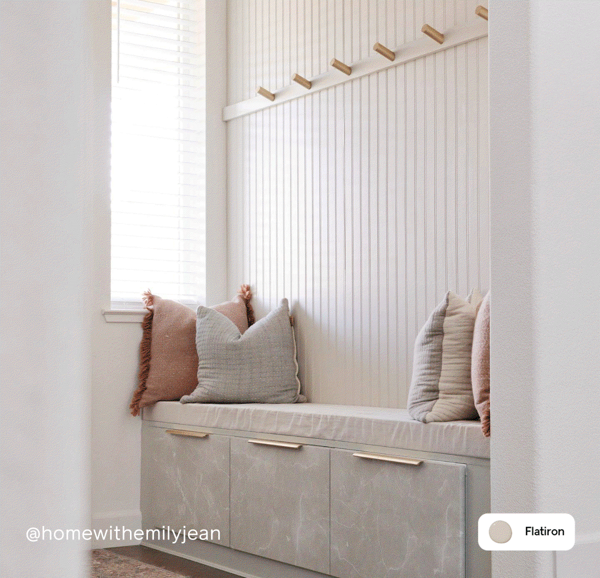 Entryway featuring warm taupe paint color Flatiron