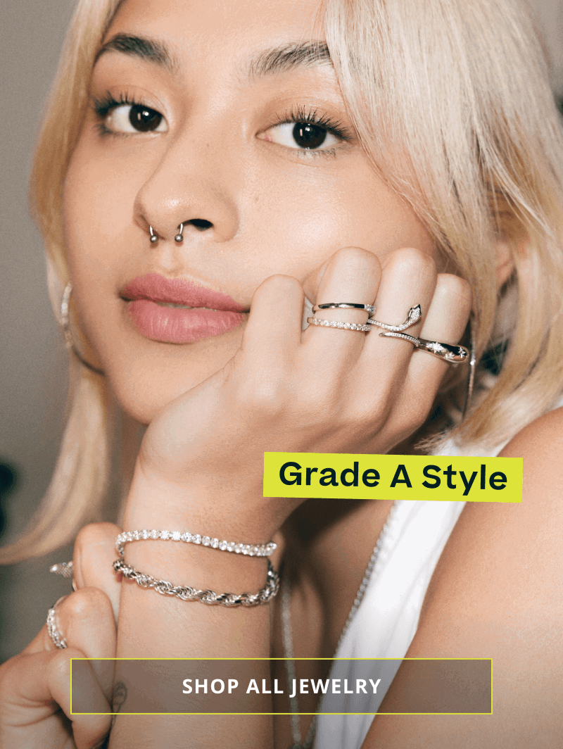 Model with silver ring & bracelet stack with diamonds. Grade A Style. Click here to shop all jewelry 