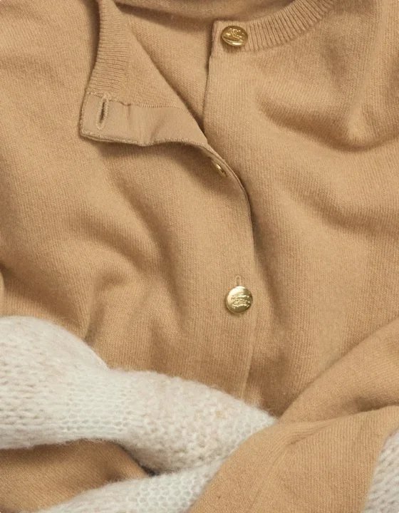 SWEATERS