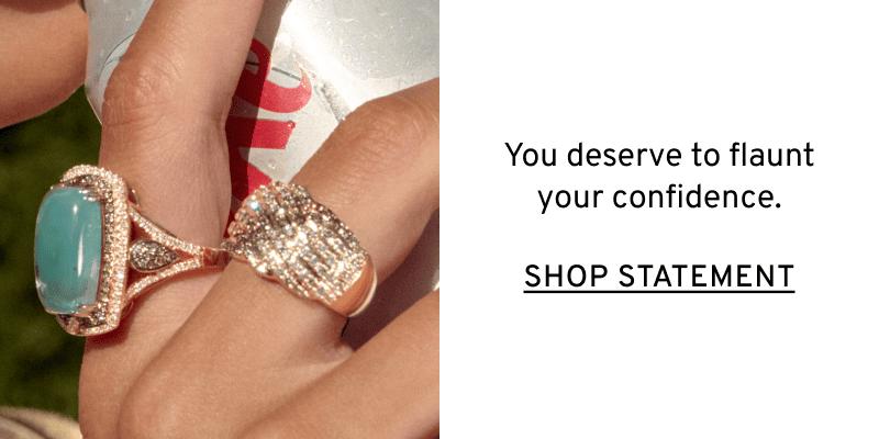 A model’s hand wearing two different statement rings. Flaunt your confidence. Click to Shop Statement Rings
