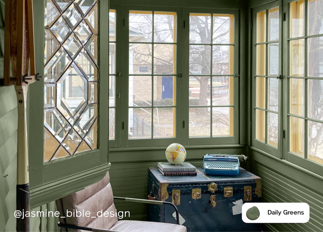 Sunroom featuring hunter green paint color Daily Greens