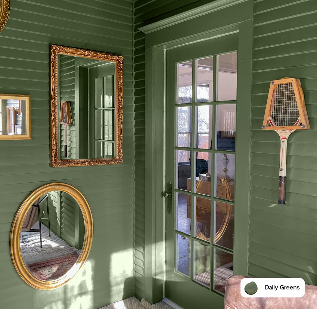 Sunroom featuring hunter green paint color Daily Greens
