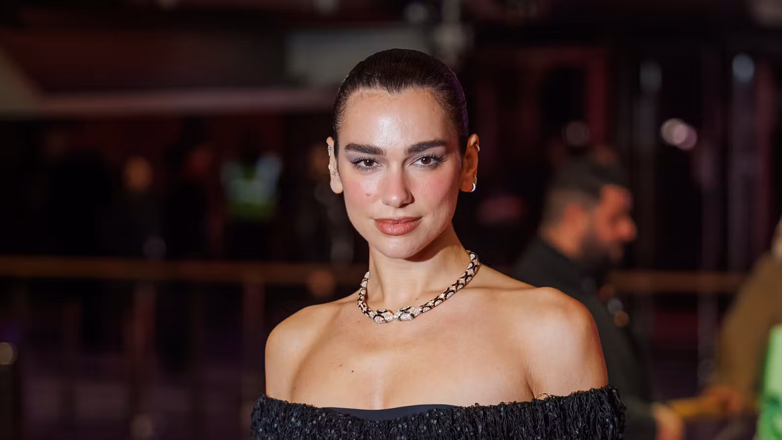 Dua Lipa’s Extra-Large Chanel Tote Is The Ultimate Travel Bag