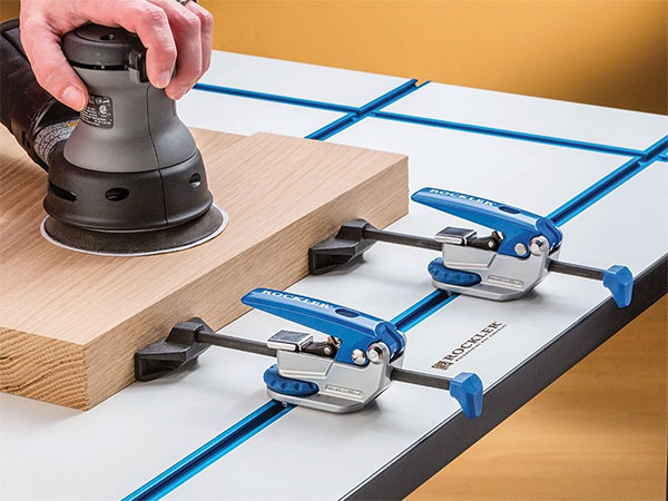 Sanding a board 