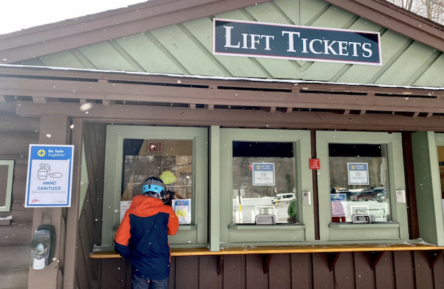 Skier buying lift ticket