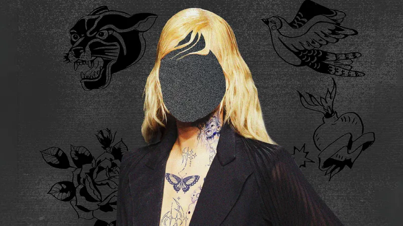 tattooed woman with her face blocked out
