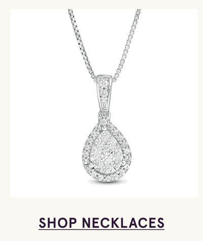 White metal pendant with teardrop-shaped pavé cluster surrounded by halo of stones. Click here to shop necklaces
