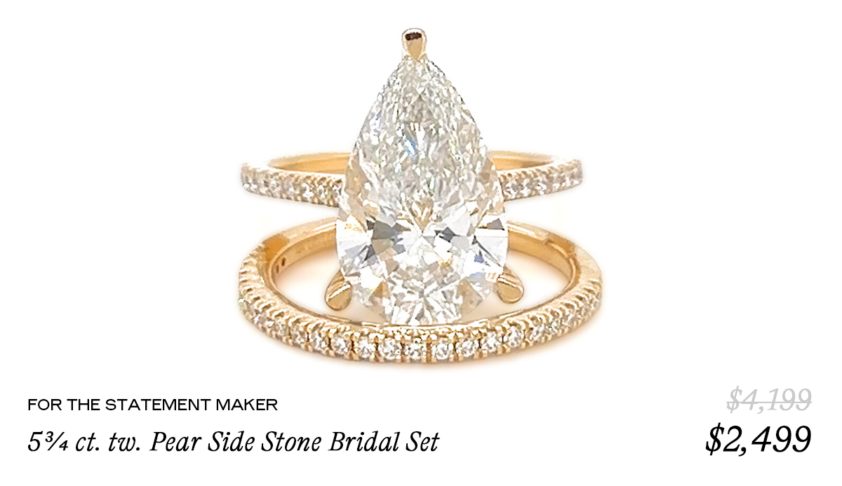 FOR THE STATEMENT MAKER 5¾ ct. tw. Pear Side Stone Bridal Set