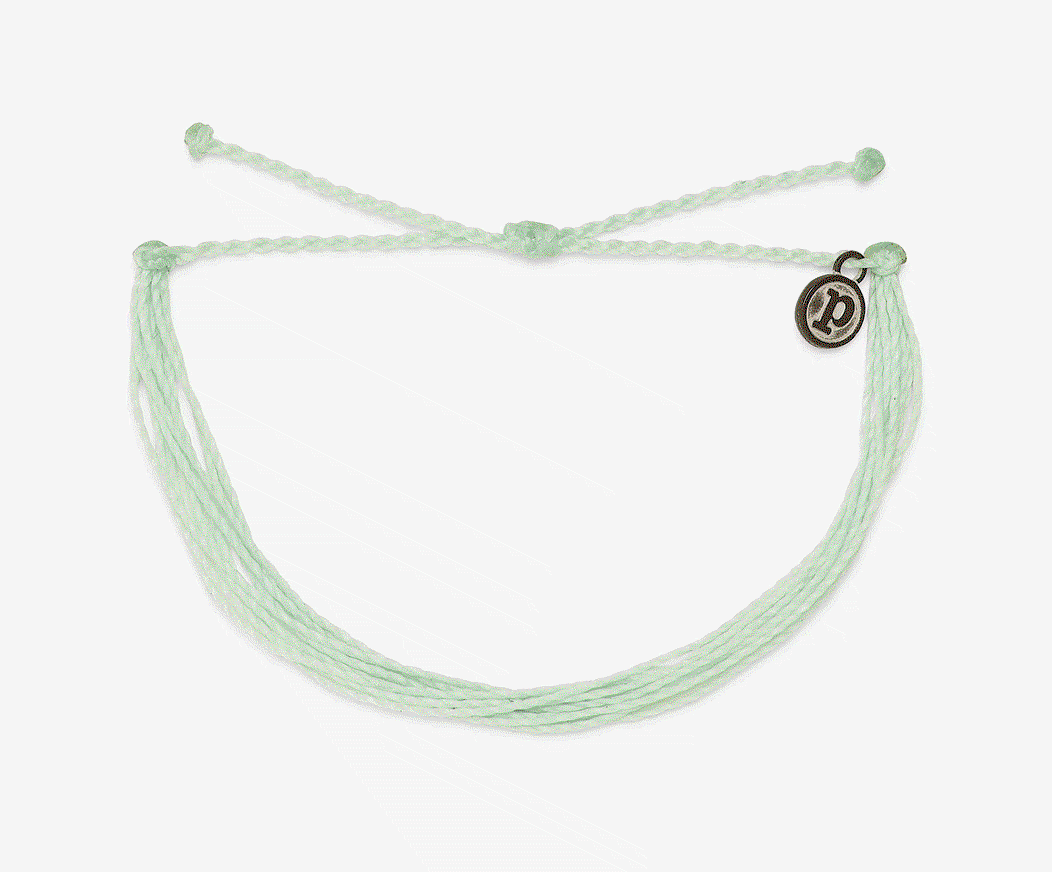 Animated display cycling through colorful Pura Vida friendship bracelets with adjustable ties and a small silver logo charm.