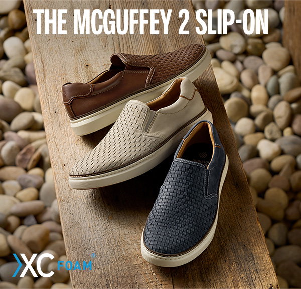 Three McGuffey 2 Slip-On shoes in brown, beige, and navy woven styles displayed on a wooden bench. Text reads: 