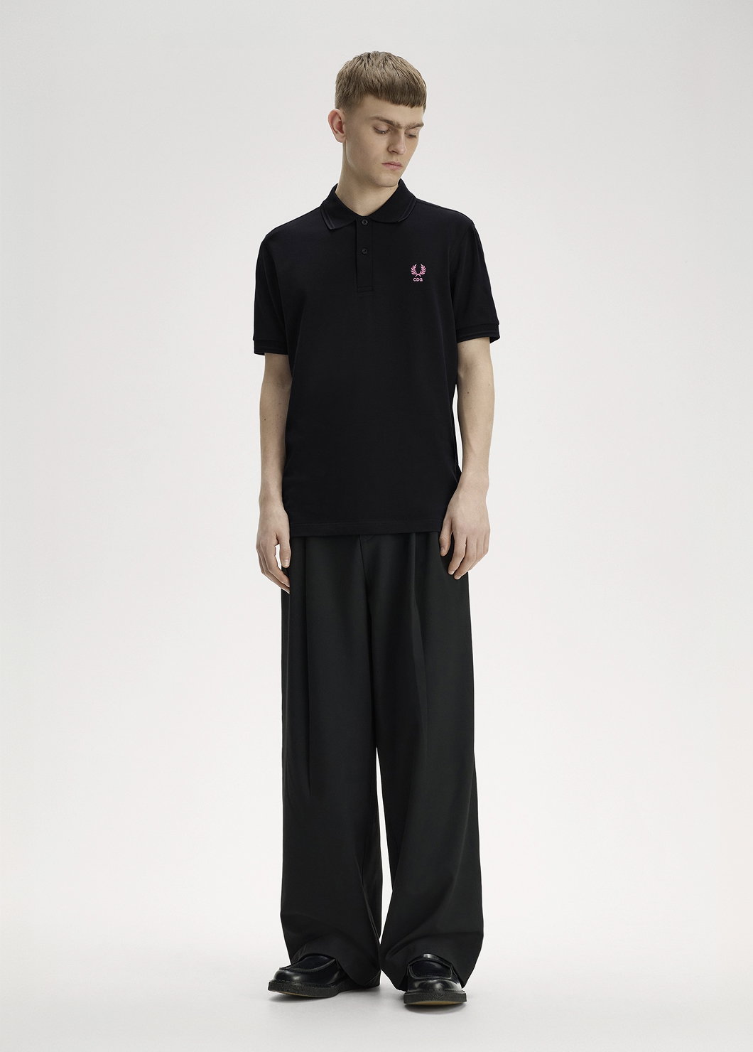 Male model wearing a Fred Perry x Comme des Garçons SHIRT