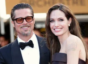 Angelina Jolie (R) and Brad Pitt attend "The Tree Of Life" premiere during the 64th Annual Cannes Film Festival at Palais des Festivals on May 16, 2011 in Cannes, France.
