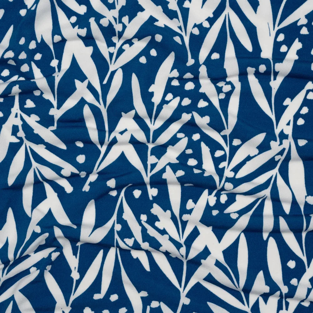 Image of Stretch Polyester Tricot - Blue and White Leafy Stems - Designer Deadstock