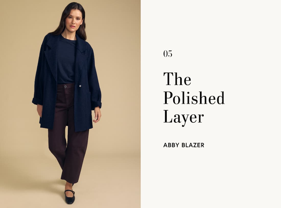 Image of model wearing Abby in Navy. Text reads: The Polished Layer