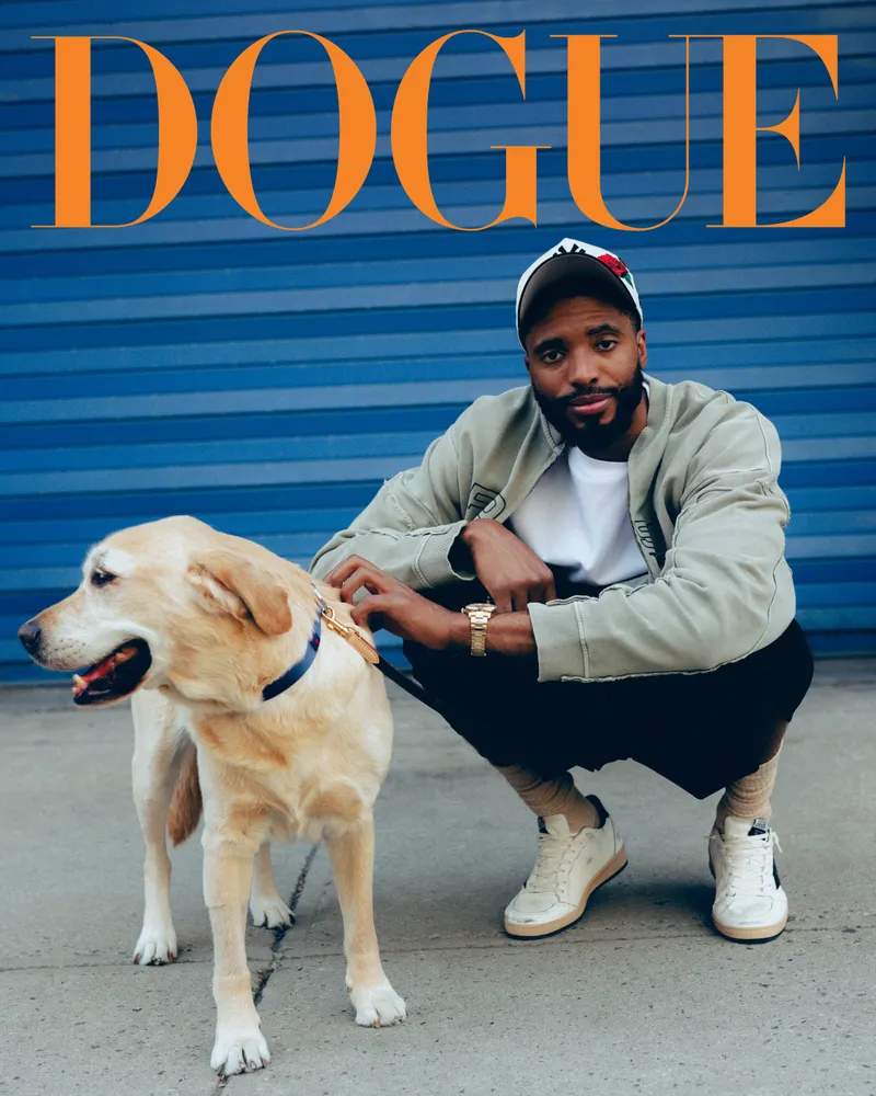 Image may contain: Mikal Bridges, Clothing, Footwear, Shoe, Baseball Cap, Cap, Hat, Adult, Person, Animal, Canine, and Dog