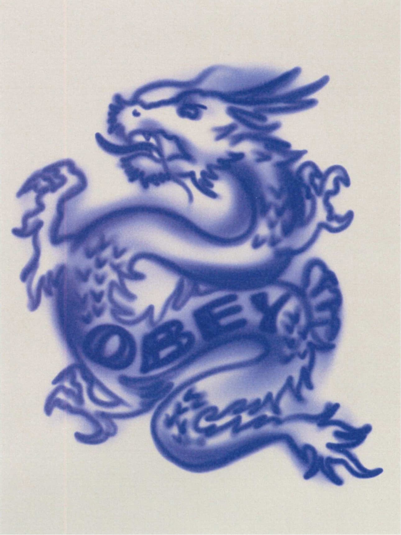 Sprayed blue dragon, Obey written inside it