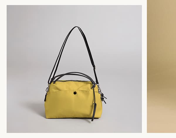 Image of model wearing Nylon Bag in Yellow.