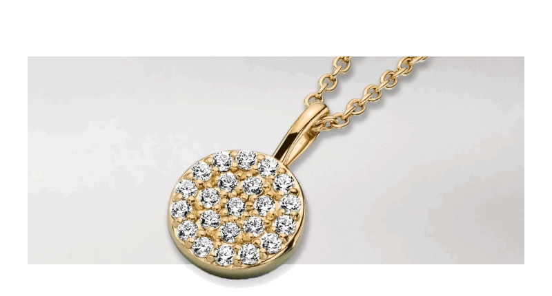 Yellow gold round diamond cluster pendant necklace.