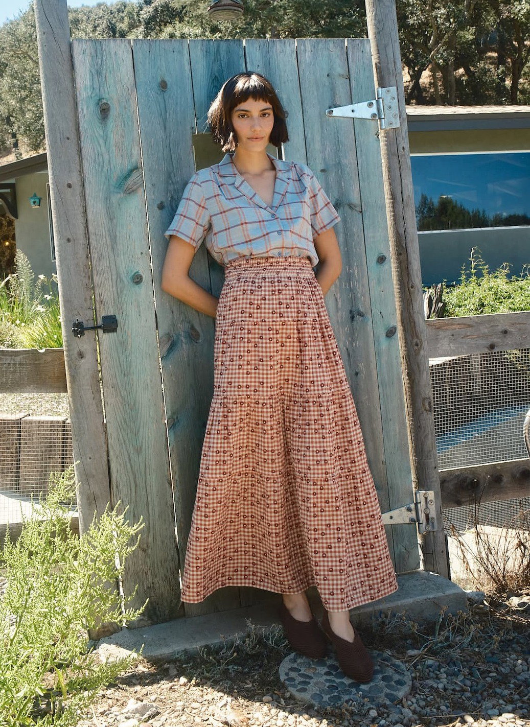 model in multi textile outfit
