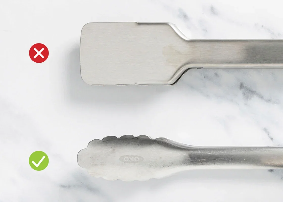 Comparing tongs with wide flat heads vs. ones with narrow heads with scalloped edges.