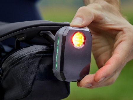 Trek CarBack radar rear bike light held in hand