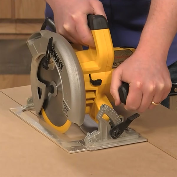 Circular saw cutting along line