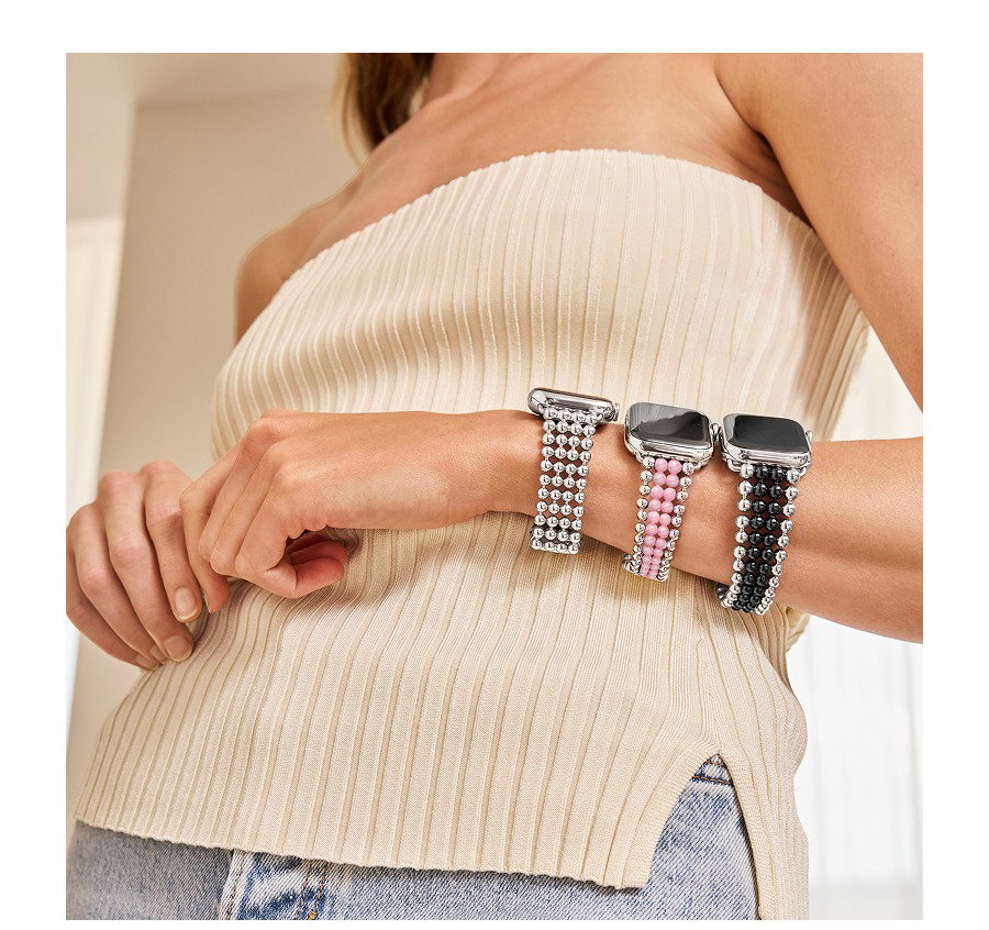 Woman with three Smart Caviar styles on her wrist