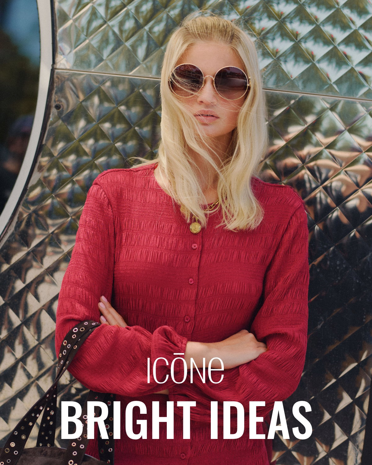 Icône Bright Ideas. Young woman wearing a red dress and oversized round sunglasses