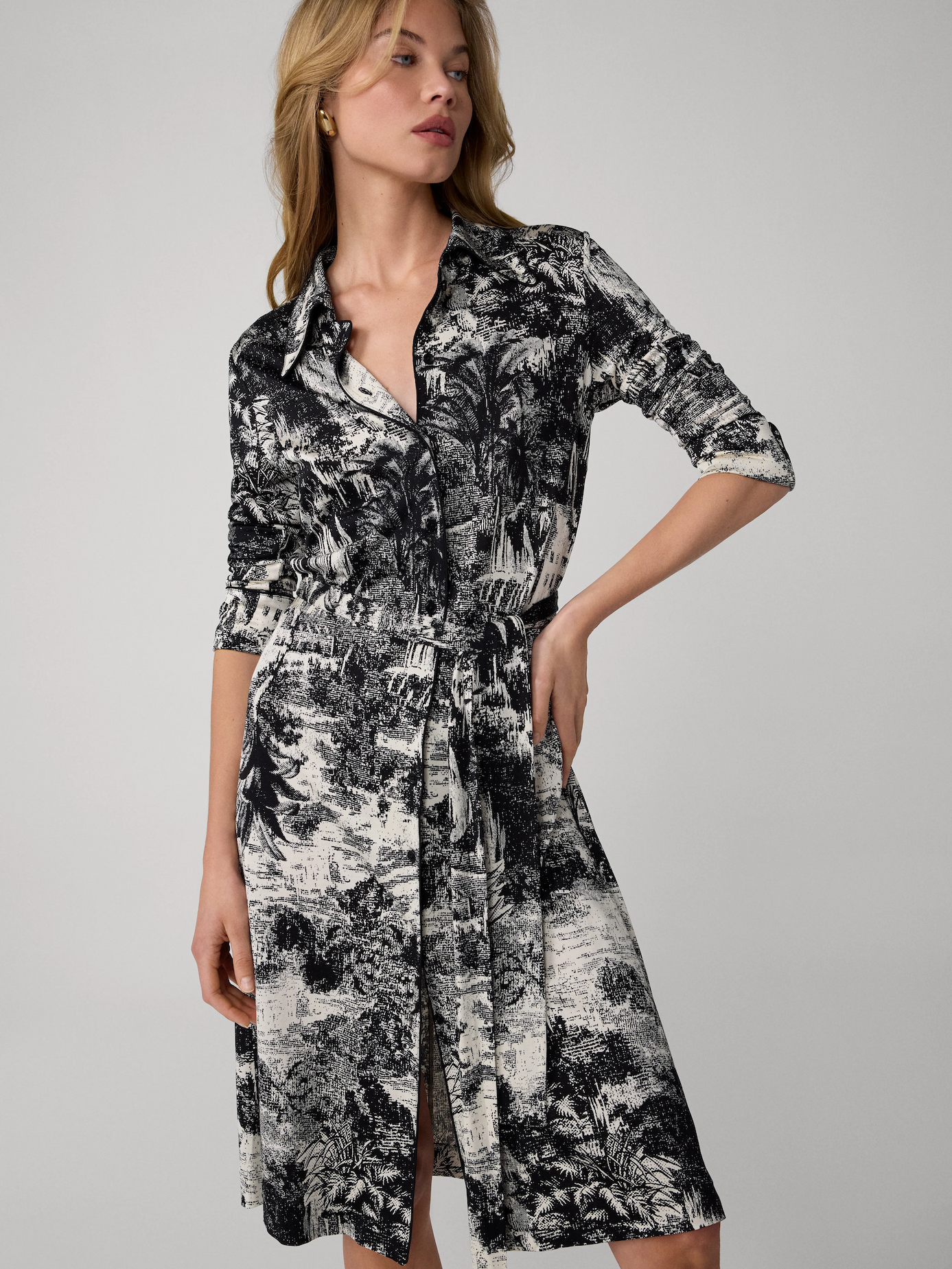 Model wearing a long-sleeve shirt dress.